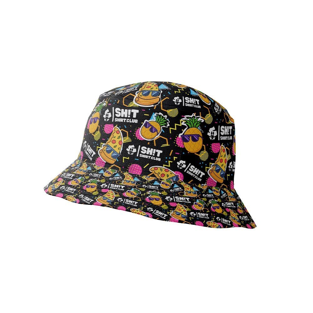 The Wanna Pizza This Shirt bucket hat features playful cartoon pizza slices, pineapples, sunglasses, and “SH*T SHIRT CLUB” and Bad Shirt Club logos on a black background—perfect to pair with your favorite funny shirt.