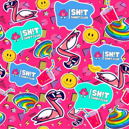 The Badass Bucket Hat features a colorful collage on pink: flamingos in sunglasses, rainbow poop emojis, smiley faces, drinks with straws, and “SH!T SHIRT CLUB” bubbles—your go-to accessory for festivals and bold style.