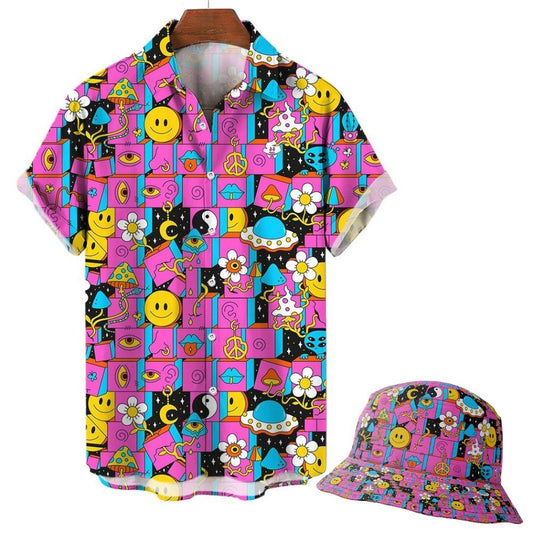 The Trippy Space Shirt is a short-sleeve button-up with a matching bucket hat, featuring an electric blue pattern of smiley faces, cats, UFOs, daisies, yin-yangs, pizza slices, hearts, and shapes on a pink and blue grid.