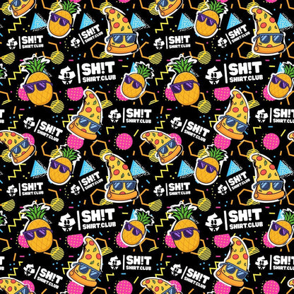 The “Wanna Pizza This Bucket Hat” features a vibrant, repeating pattern of pineapples with sunglasses, pizza slices in bucket hats, tropical drinks, geometric shapes, and “SH!T SHIRT CLUB” logos on a black background.
