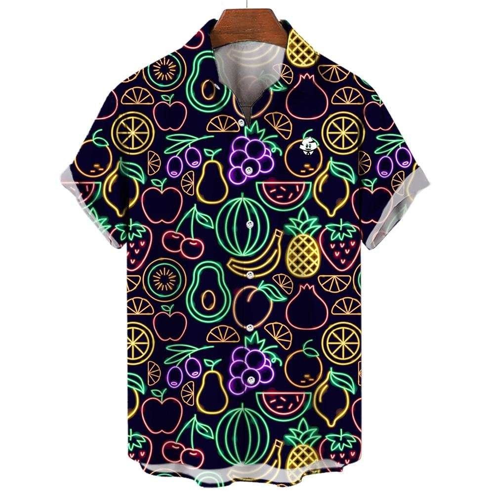 The Fluorescent Fruit Fiesta Shirt is a short-sleeve button-up featuring neon pineapples, watermelons, grapes, lemons, apples, and avocados on a dark background—a vibrant choice for any party. Displayed on a hanger.