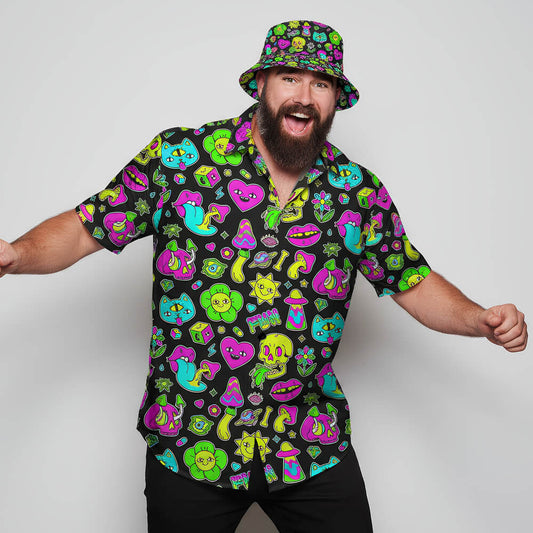 Man wearing a colourful patterned shirt and bucket hat on a plain background