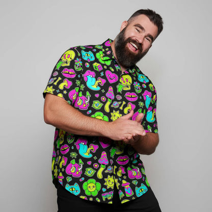 Man wearing a colourful patterned shirt with a gray background