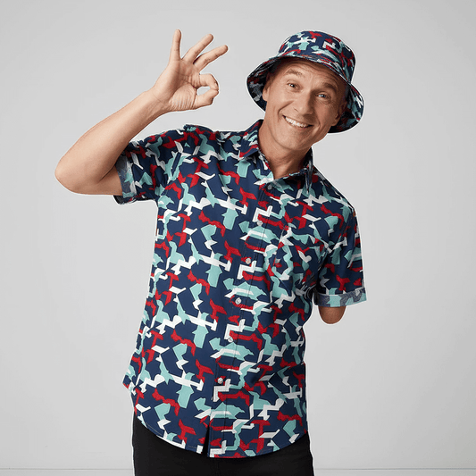 Man wearing Combat2Coffee Army Camo Shit Shirt and matching Combat2Coffee Bucket Hat on a grey 