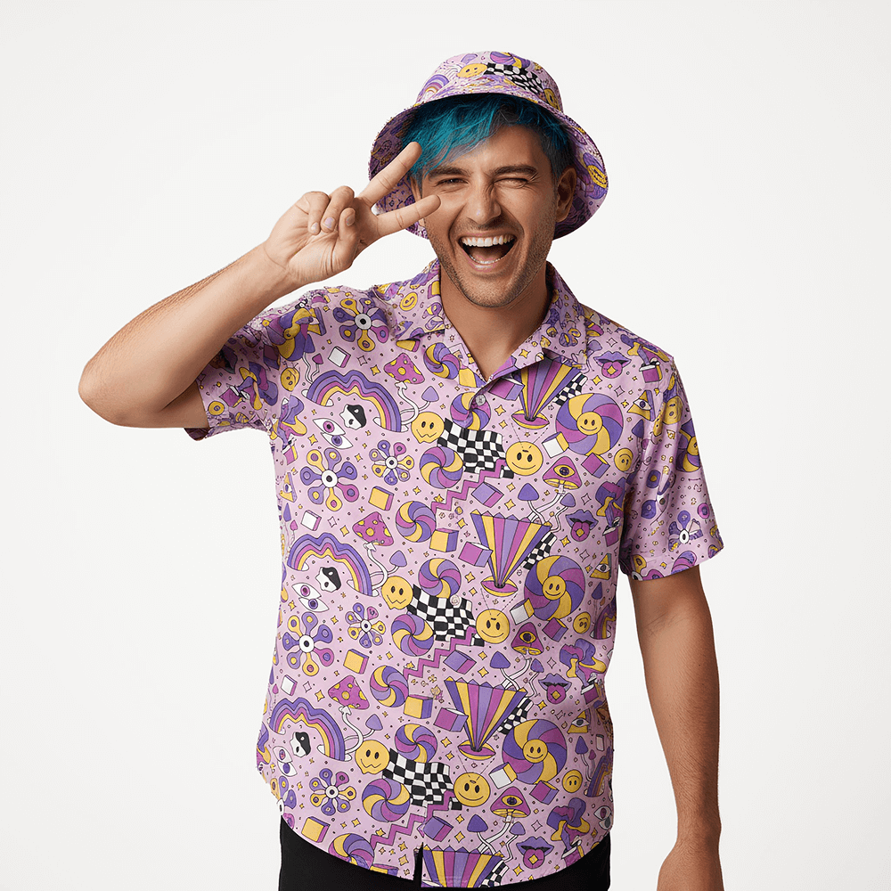 Person with blue hair wearing the Hippie Shit Shirt and matching bucket hat on a white background
