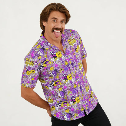 Man wearing a colourful patterned shirt on a white background