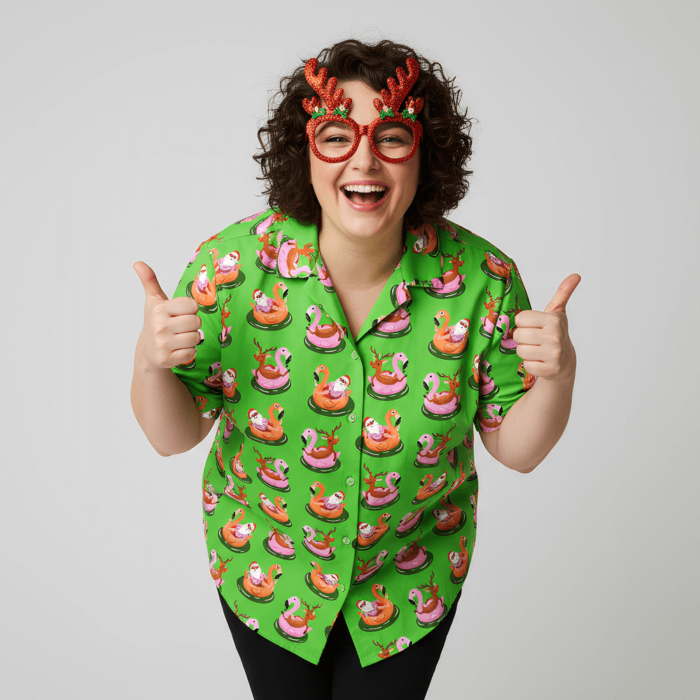 Woman wearing the Pool Party Shit Xmas Shirt and reindeer antler glasses doing thumbs up on a plain background