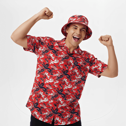 Person wearing the Red England FC Shit Shirt and matching bucket hat on a white background