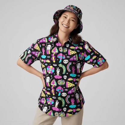 Woman wearing the Shroom Shit Shirt and matching Shroom Bucket Hat on a grey background