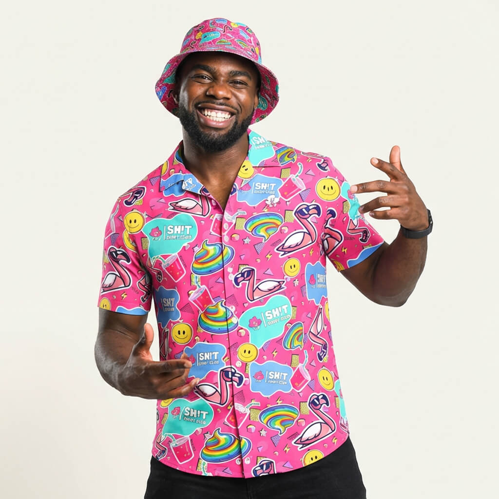 Person wearing a colourful patterned shirt and bucket hat on a white background