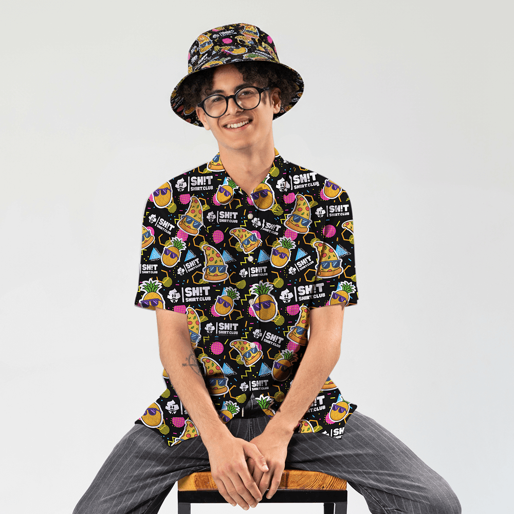 Person wearing the Wanna Pizza This Shit Shirt and matching Wanna Pizza This Bucket Hat sitting on a stool 