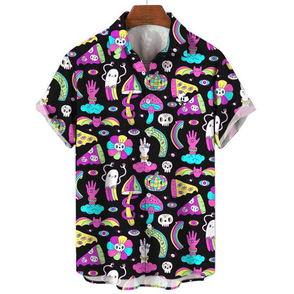The Shroom Shirt is a short-sleeve button-up with a black base, decorated with neon pink, blue, yellow, and green cartoon mushrooms, clouds, rainbows, skulls, stars, and whimsical creatures.